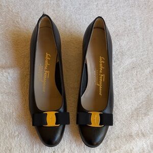 Salvatore Ferragamo Black Flats with Gold Accent